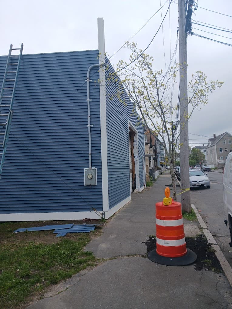 Light blue commercial property painting project in Massachusetts - NG Painting Pro commercial work