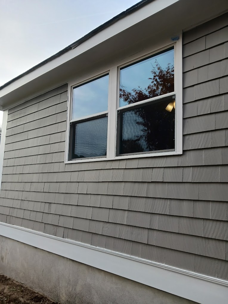 Gray shingle siding exterior
